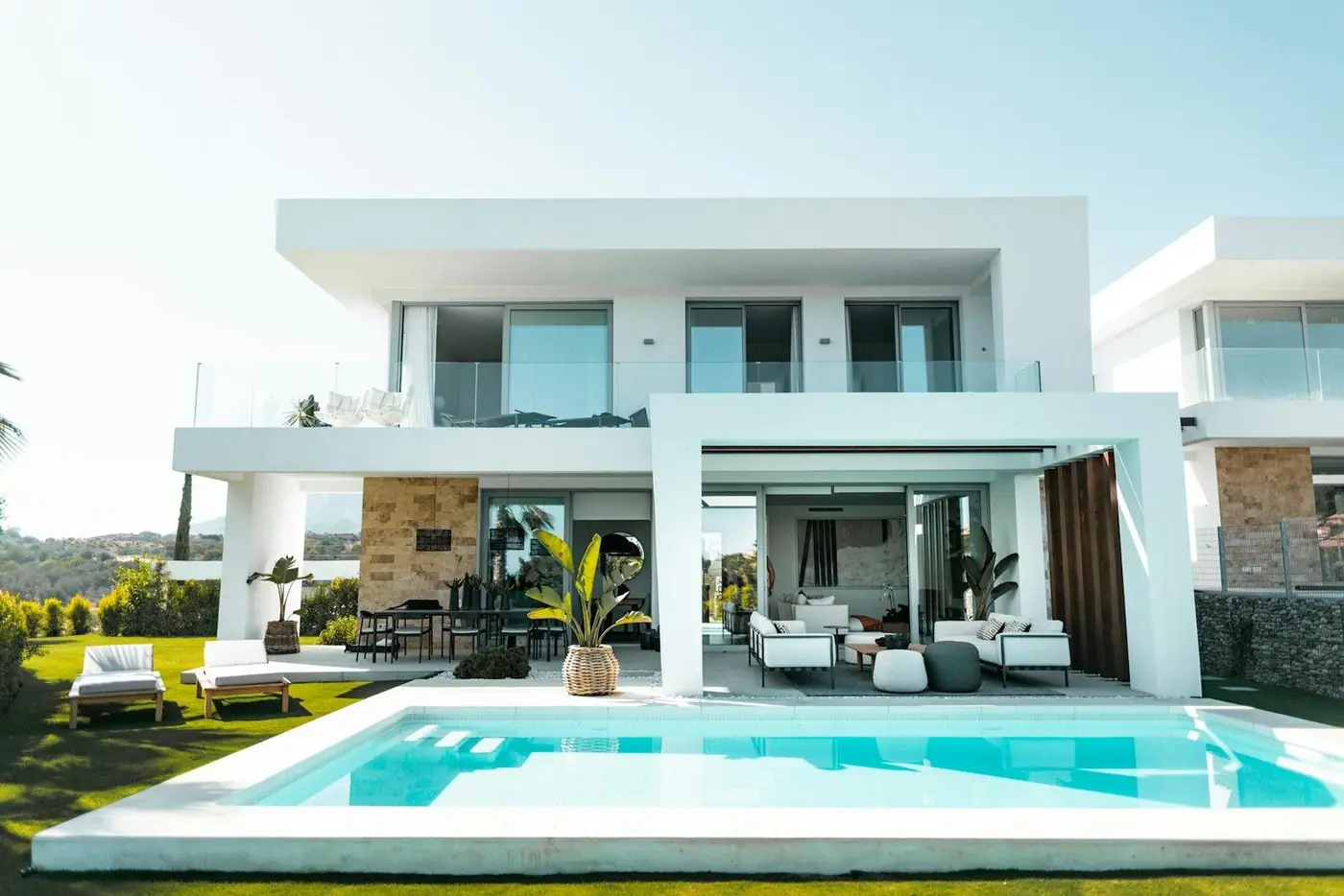 White contemporary villa with a pool
